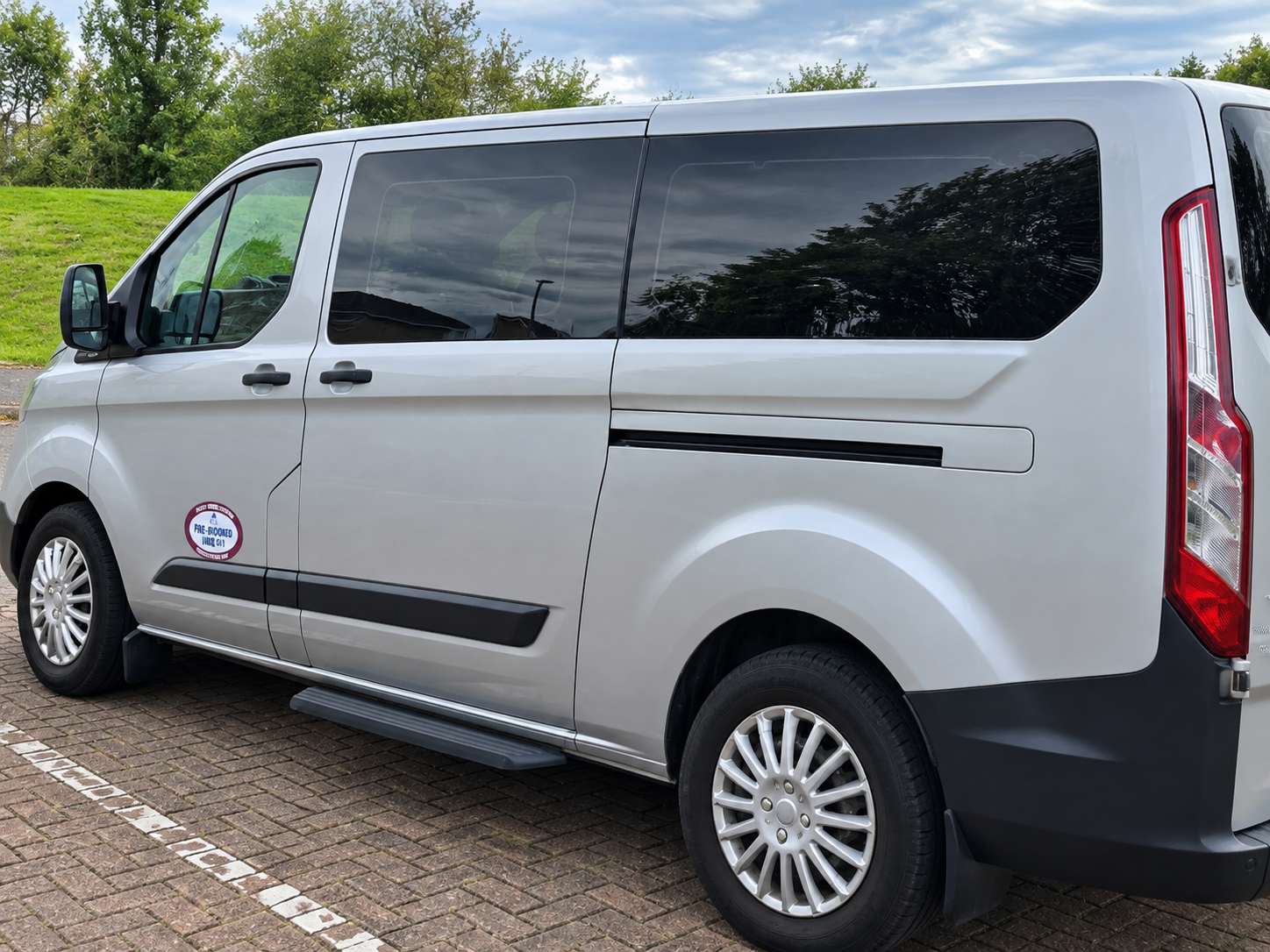 Convoy Travel silver Ford Transit Custom 8-seater